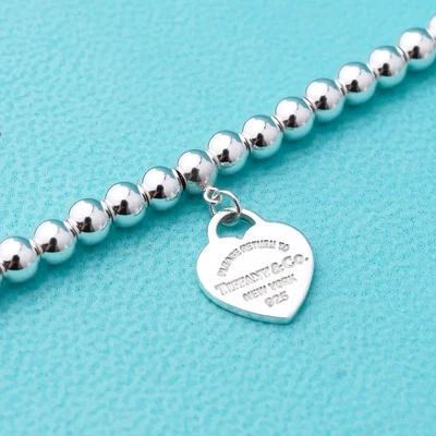 Pulsera de Cuentas con Corazón Esmalte Rosa en Plata 925