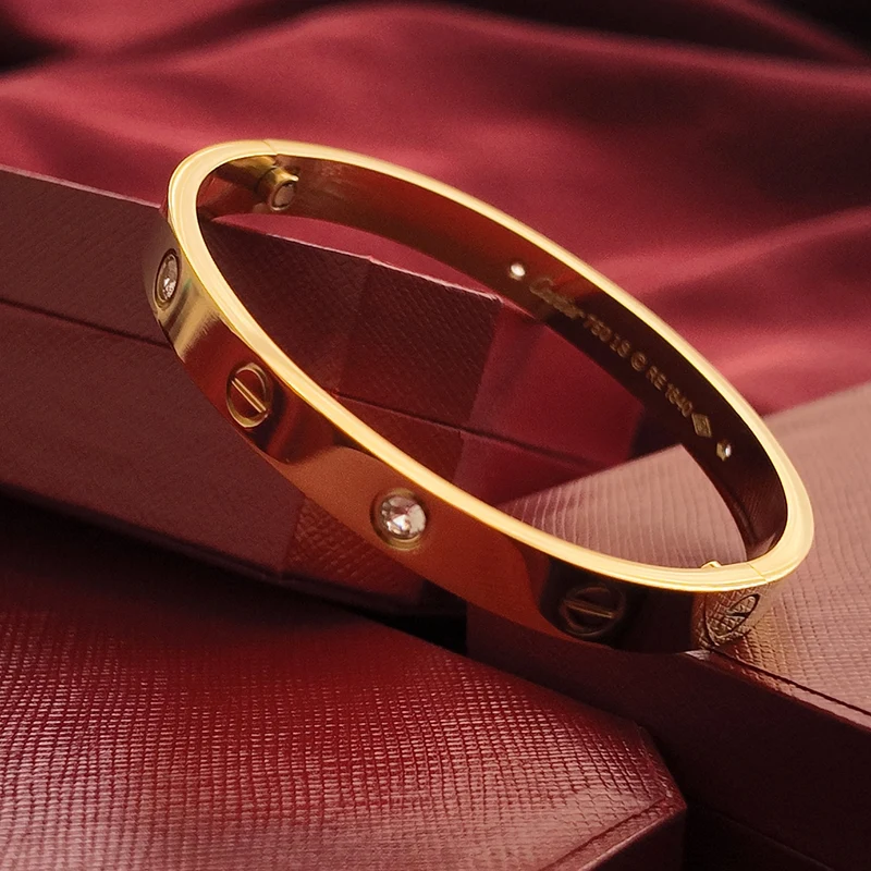 Brazalete de Tornillos con Piedras Tono Oro Amarillo