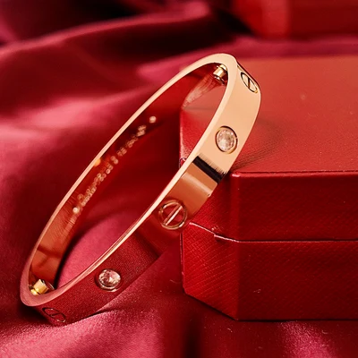 Brazalete de Tornillos con Piedras Tono Oro Rosa